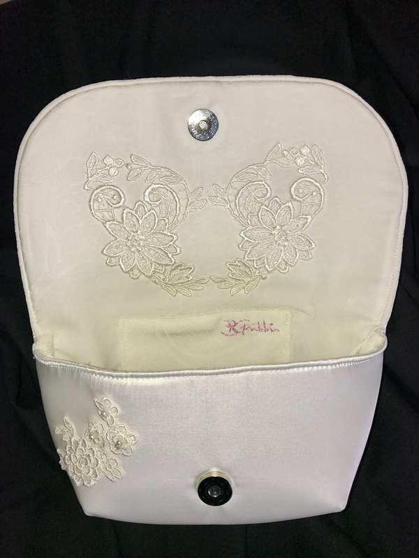 White satin and lace bridal bag created from family wedding veil.