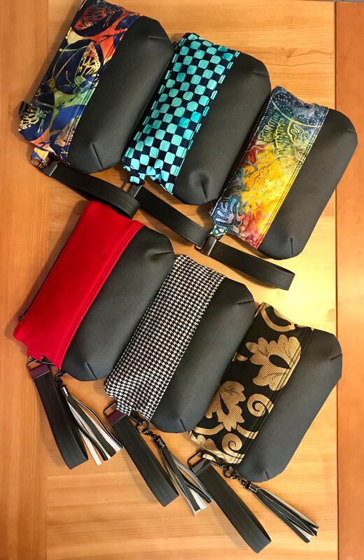 Multi-colored wristlet bags created with @salietomato pattern. 